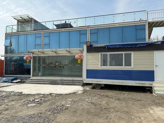 Rapidamente montar Casa de pacote plano Painel de sanduíche de aço Casa de módulo pré-fabricada Hotel de luxo Resort Habitação Habitação